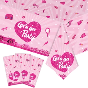 Pink girl-themed party supplies featuring Let's Go Party text with hearts and rollers