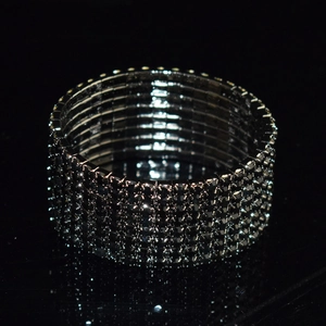 Macro shot of multi-row black rhinestone stretch bracelet with gunmetal plating