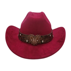 Detail of western cowboy hat with rhinestone heart buckle and embossed leather band
