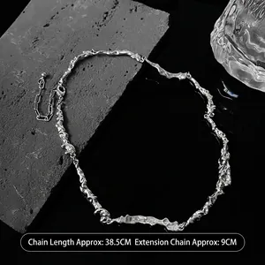 Detail of irregular lava texture necklace with lobster clasp and adjustable extension chain