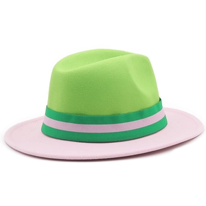 Two-tone wool fedora hat in green and pink with a striped ribbon band for photography