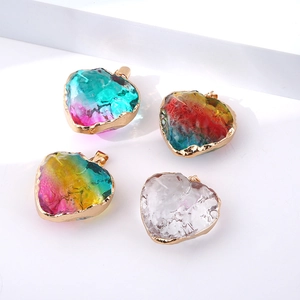 Colorful crystal heart pendants with gold-plated edges in multiple gradient color options