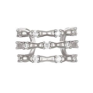 Macro shot of silver triple-row zircon ear cuff with multi-claw setting detail