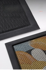 Close-up of non-slip TPE backing and honeycomb surface of the luxury entrance mat