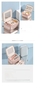 Detail view showing internal structure of PU leather travel jewelry box with mirror and slots