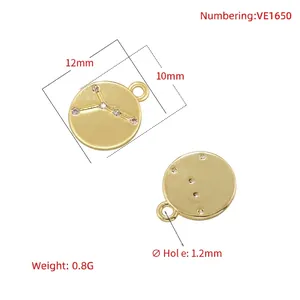 Golden zodiac pendant pair with micro-pave cubic zirconia in brass constellation design