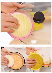 Kitchen sponge detail showing yellow mesh and scouring pad side cleaning a glass lid