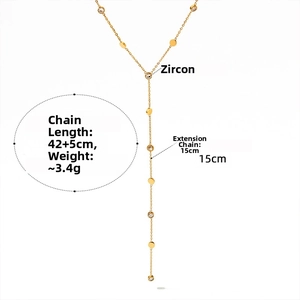 Detail view of gold Y-shaped necklace with zircon drop and measurement specifications
