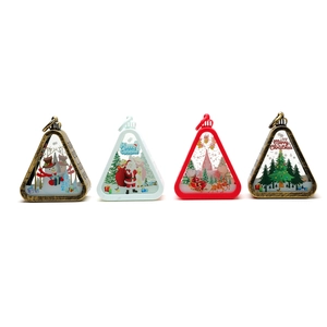 Vintage Christmas LED lanterns with Santa, Snowman, and Reindeer patterns in a 4-piece set