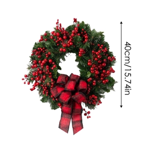 Detail view of 40cm Christmas wreath with red berries and black-red checkered bow