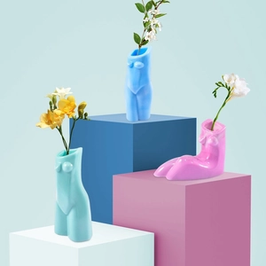 Abstract female body vase set in various poses and pastel colors for home decor