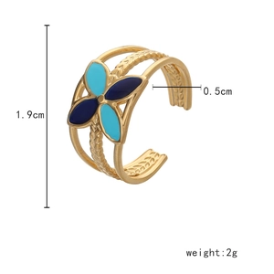 Detail shot of blue-green enamel heart ring with measurements and 2g weight data
