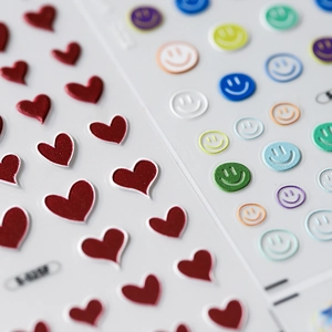 3D minimalist nail stickers with red hearts and colorful smiley faces on S-1123M sheet