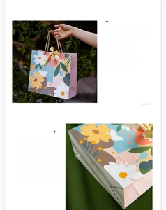 Detail of floral gift bag showing reinforced glued base and woven rope handle with ribbon