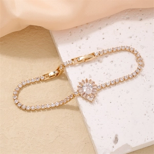 Elegant gold-plated waterdrop zircon bracelet with sparkling halo design on white stone