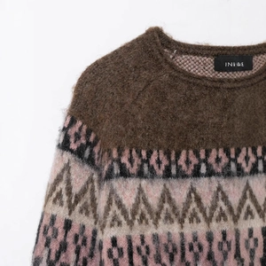 Chic crew neck knit sweater featuring vintage jacquard geometric patterns in brown tones