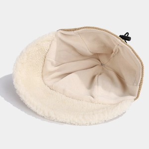Detailed view of winter bucket hat with thick lamb wool lining and adjustable drawstring
