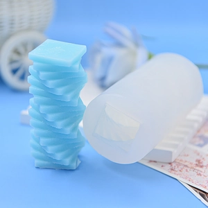Spiral cube silicone mold for DIY aromatherapy candles and soaps with blue wax sample