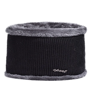 Detail of winter neck warmer with black ribbed knit exterior and thick gray fleece lining