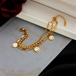 Gold multi-layer stainless steel beaded chain bracelet with three smile face pendants