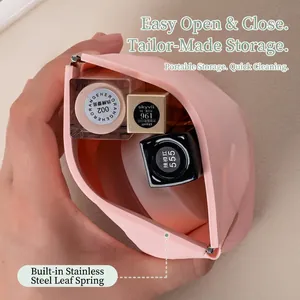 Pink silicone mini storage pouch with auto-close metal spring for lipsticks and gadgets