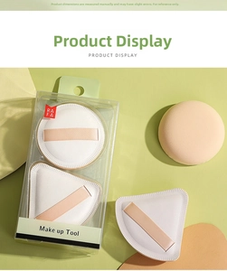 Set aus runden und dreieckigen Make-up-Schwämmen in Box auf minimalistischem Hintergrund