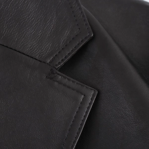 Close-up of the black PU leather collar detailing and refined double-stitched craftsmanship