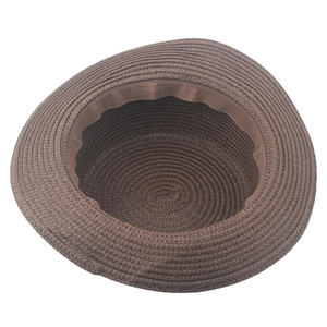 Detailed inner view of dark brown straw hat with high-density weave and ribbon sweatband