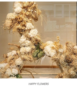 Close-up of natural raffia fiber texture and white dried flowers for gift decoration