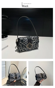 Detail of leopard print shoulder bag featuring textured fabric and gold square buckle
