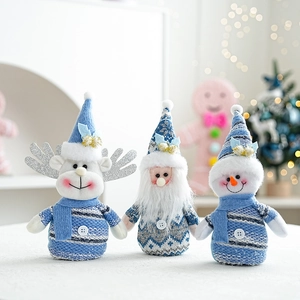 Three-piece blue and white plush Christmas set featuring Santa, snowman, and reindeer figures