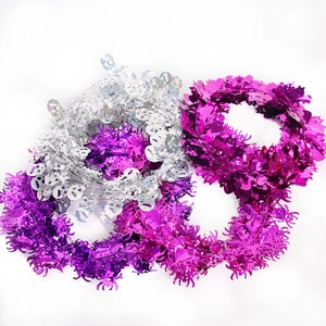 Halloween purple and iridescent tinsel garlands with spider and skull motifs, set of three