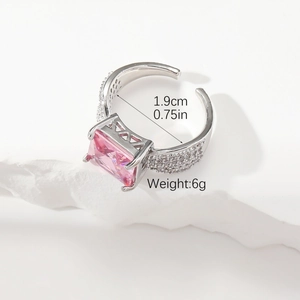 Macro shot of silver ring with pink stone, highlighting 1.9cm diameter and 6g weight