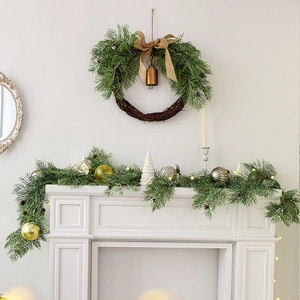 Artificial Christmas garland and wreath set with pine needles and bronze ornaments