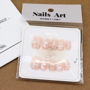 Handmade gradient pink press-on nails with white camellia flowers and pearls