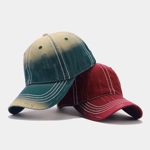 Faded washed cotton baseball caps with distressed details and contrast stitching