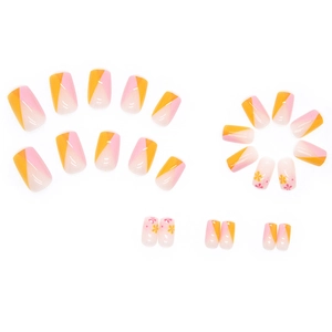 Square orange and pink press-on nails with geometric color block and floral designs