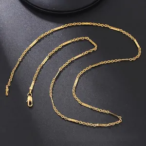 Detail of gold-plated stainless steel bamboo chain featuring a classic lobster clasp