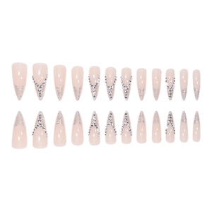 French nude pink stiletto press-on nails with silver glitter and V-shaped rhinestones