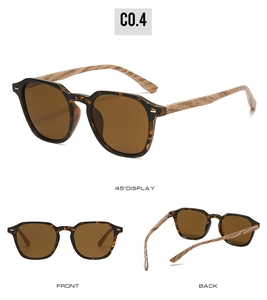 Détail de lunettes de soleil écaille avec branches à grain de bois clair et charnières