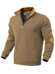 Detailed view of the textured knit fabric and collar label on a men's sweatshirt