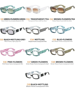 Detailed view of ten colorful rectangular sunglasses featuring diverse unique 3D floral patterns