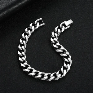 Men's silver titanium steel Cuban link bracelet with polished stainless steel finish