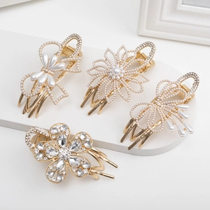 Elegant gold metal flower and bow hair claws set with white pearls and sparkling crystals