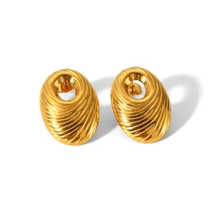 Modern vintage gold spiral oval stud earrings with hollow design and textured metal finish