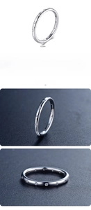 Detail of 0.2cm S925 sterling silver eternity ring with zircon stones and hallmark