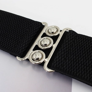 Elegant 5cm wide black elastic waist belt for women featuring silver interlocking buckle