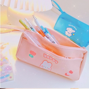 Close-up of pink double-layer canvas pencil case with cute rabbit and Happy text