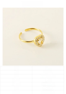 Detailed view of 18K gold plated heart ring featuring micro-pave cubic zirconia stones