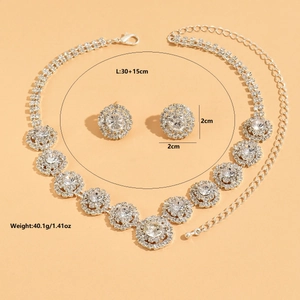 Detail view of silver bridal jewelry set with dimensions for necklace and stud earrings